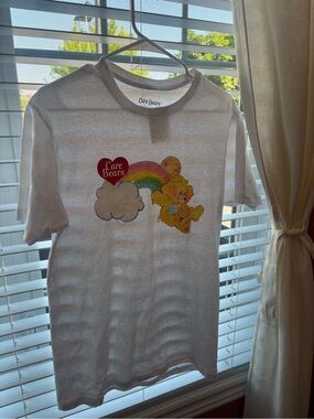 Care Bears White Tee with Yellow Bear and Rainbow Graphic